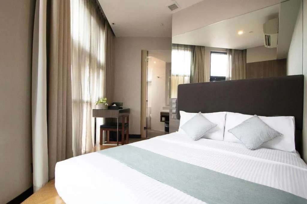 Bed in Hotel NuVe Stellar