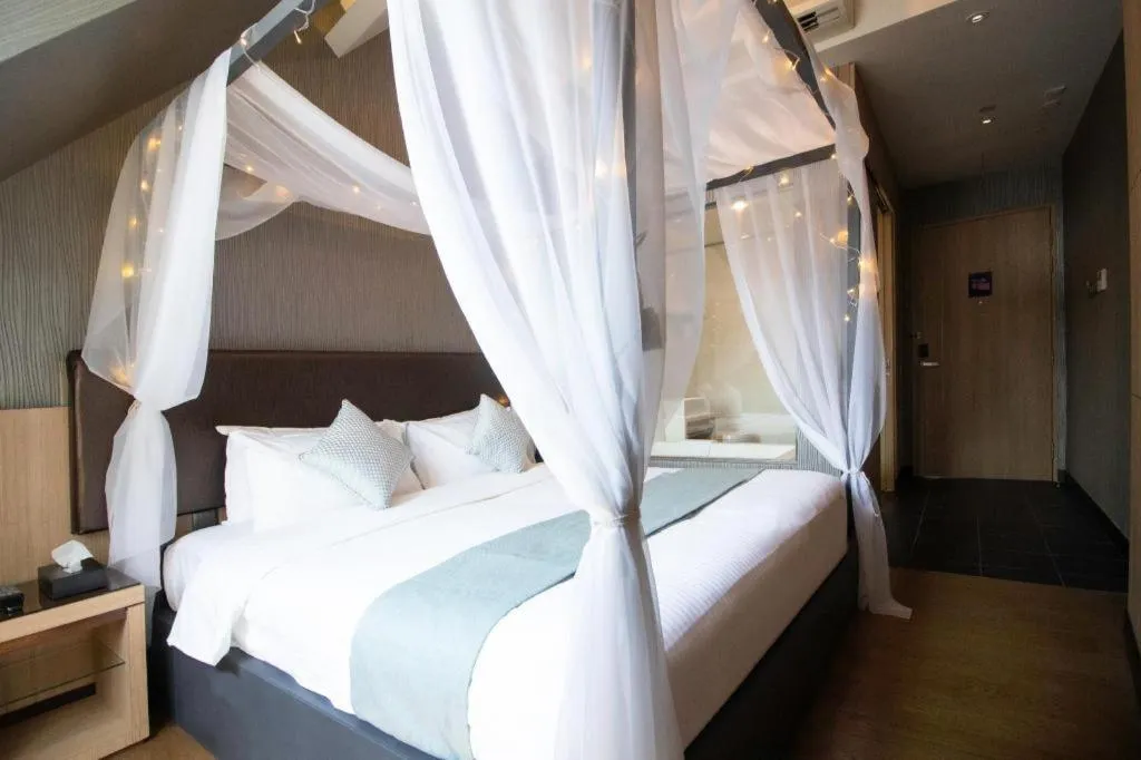 Bed in Hotel NuVe Stellar