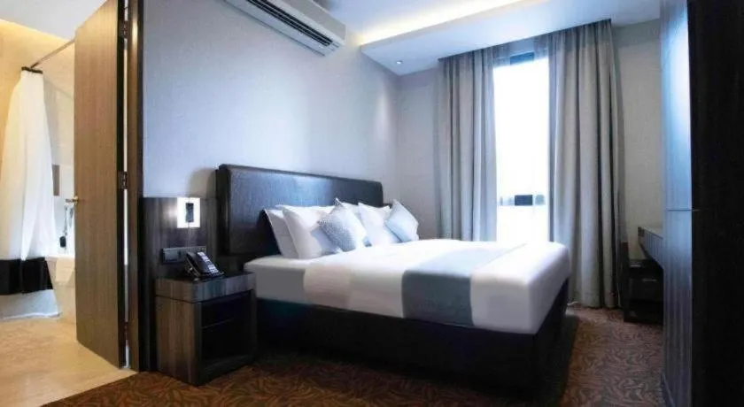 Bed in Hotel NuVe Stellar