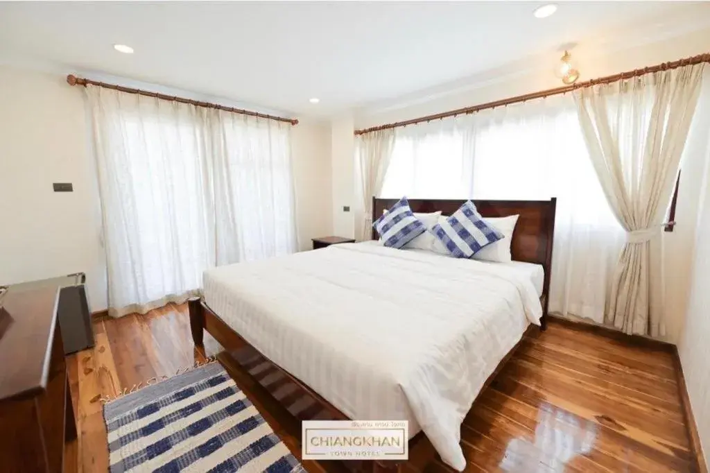 Bed in Chiangkhan Town Hotel Bed in Chiangkhan Town Hotel