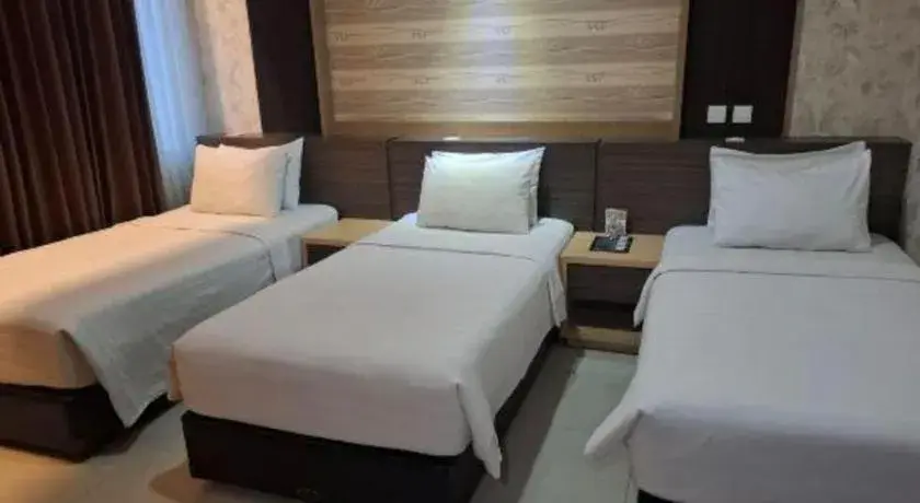 Bed in Hotel Harmoni Tasikmalaya Bed in Hotel Harmoni Tasikmalaya