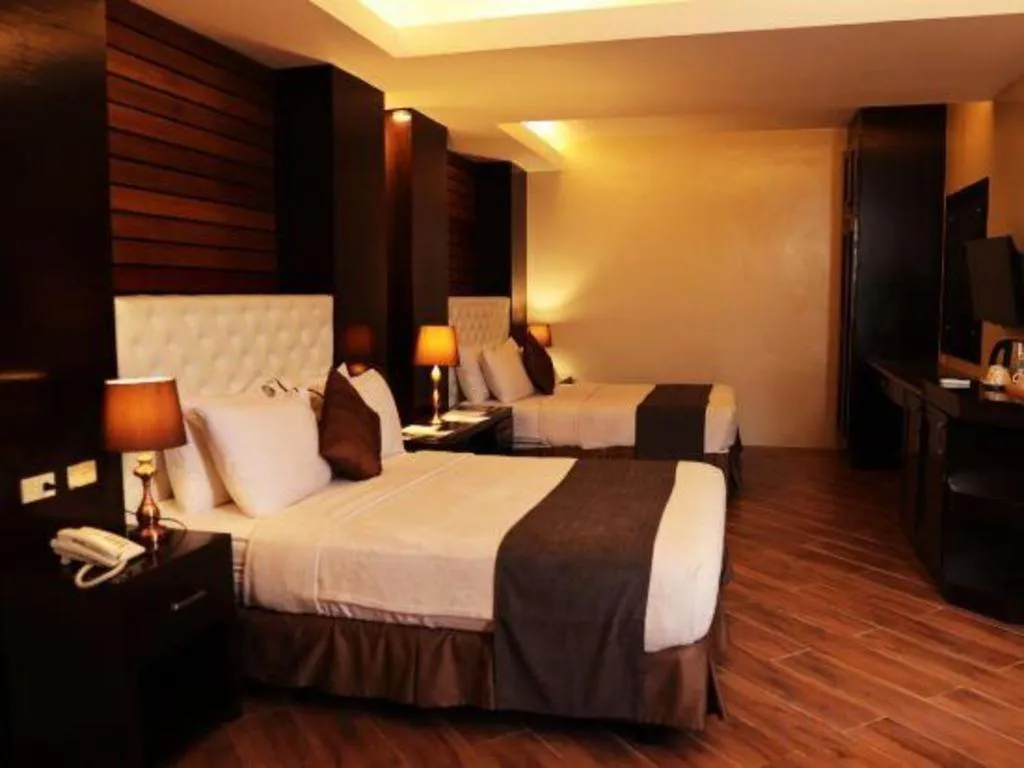 Bed in Primus Hotel and Resort