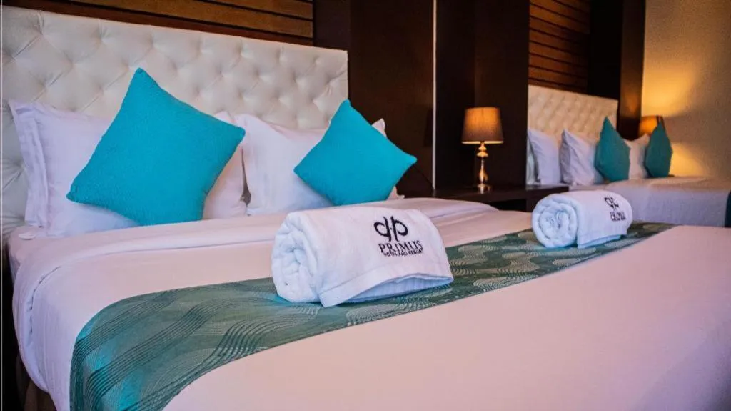 Bed in Primus Hotel and Resort