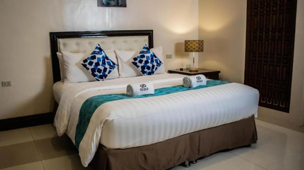 Bed in Primus Hotel and Resort