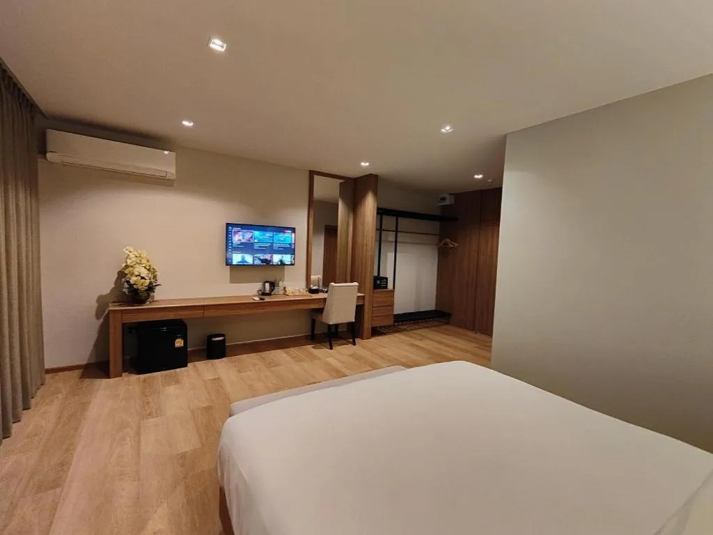 Bed in Butterfly Hotel Betong