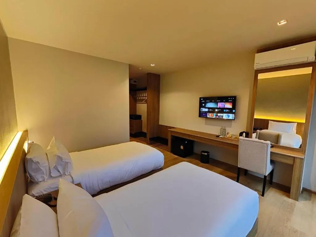 Bed in Butterfly Hotel Betong