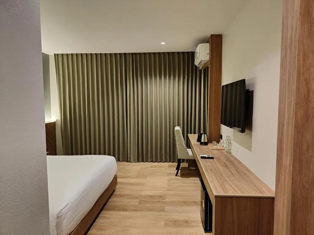 Bed in Butterfly Hotel Betong