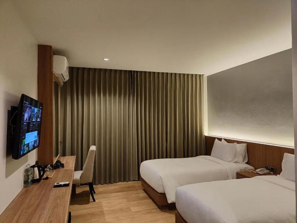 Bed in Butterfly Hotel Betong