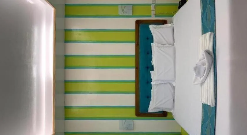 Bed in Alona Mariners Resort