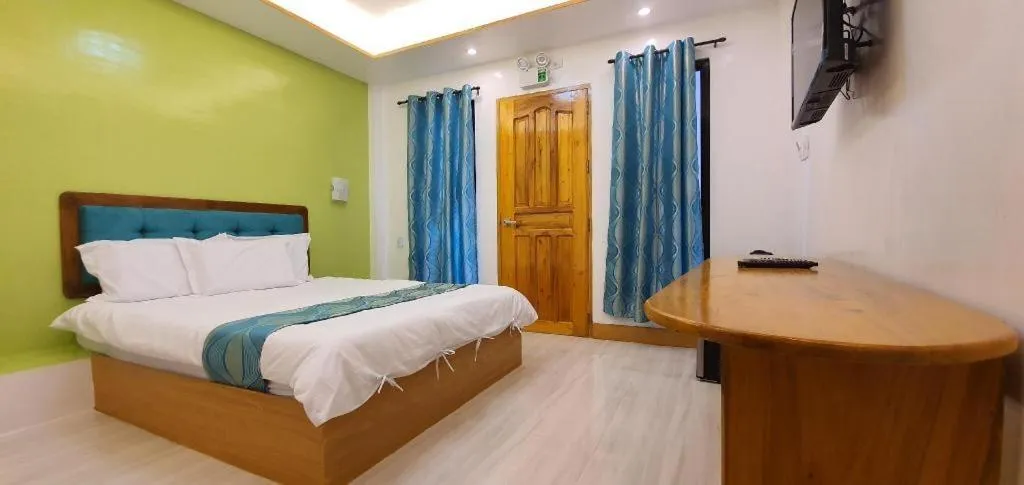 Bed in Alona Mariners Resort