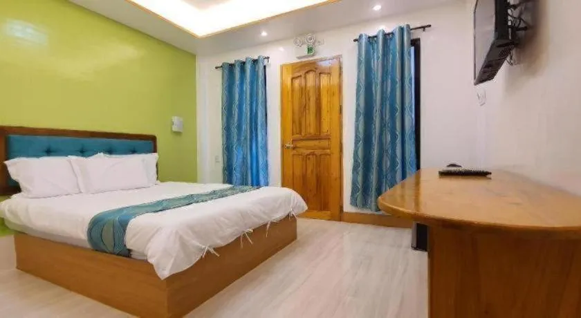 Bed in Alona Mariners Resort