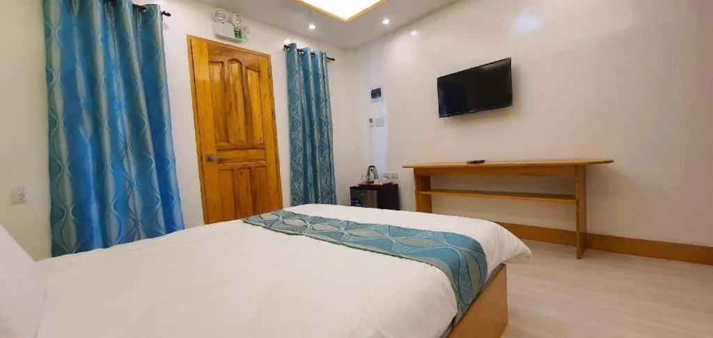 Bed in Alona Mariners Resort