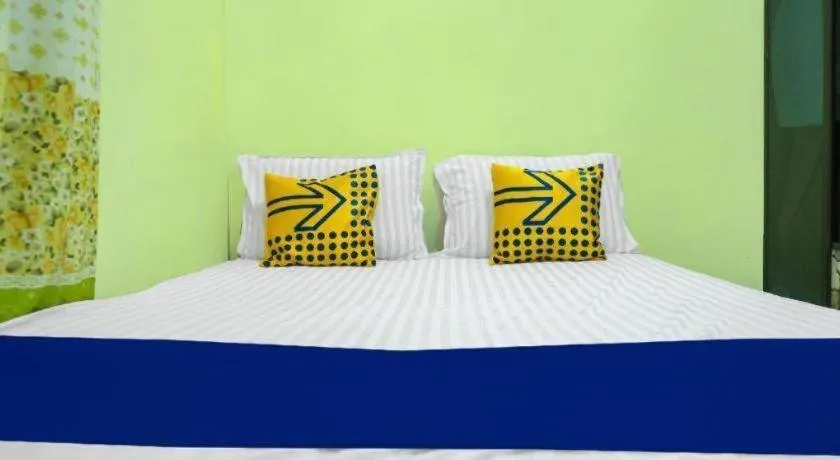 Bed in Hotel O Kost Qiu Qiu 99