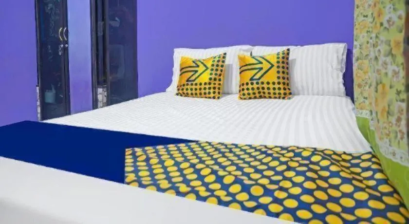 Bed in Hotel O Kost Qiu Qiu 99