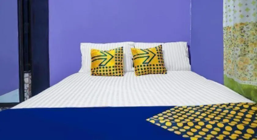 Bed in Hotel O Kost Qiu Qiu 99