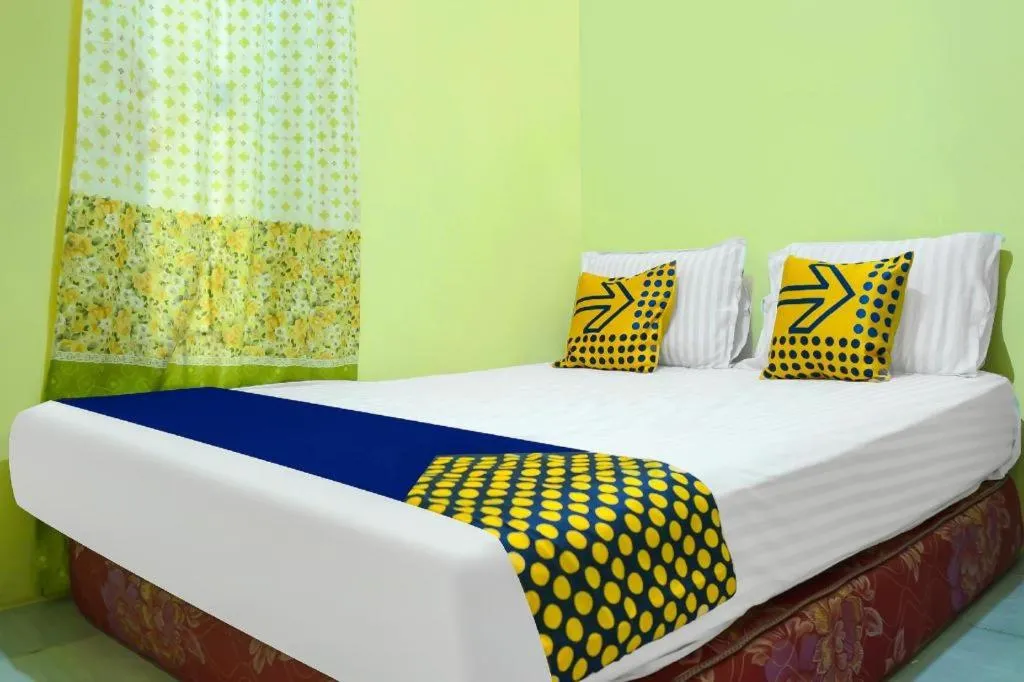 Bed in Hotel O Kost Qiu Qiu 99