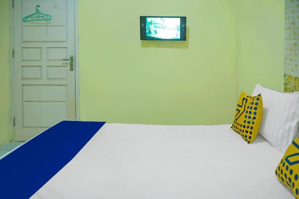 Bed in Hotel O Kost Qiu Qiu 99