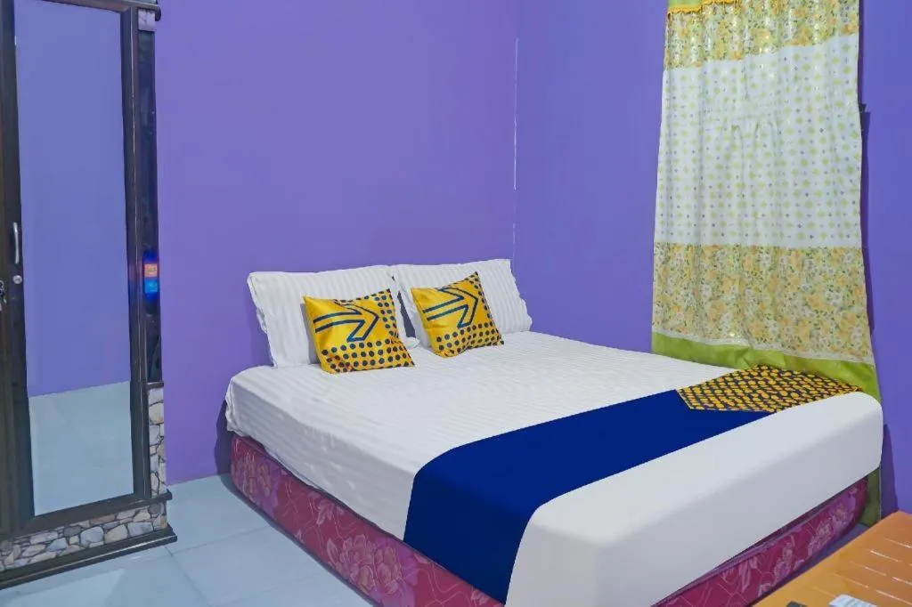 Bed in Hotel O Kost Qiu Qiu 99