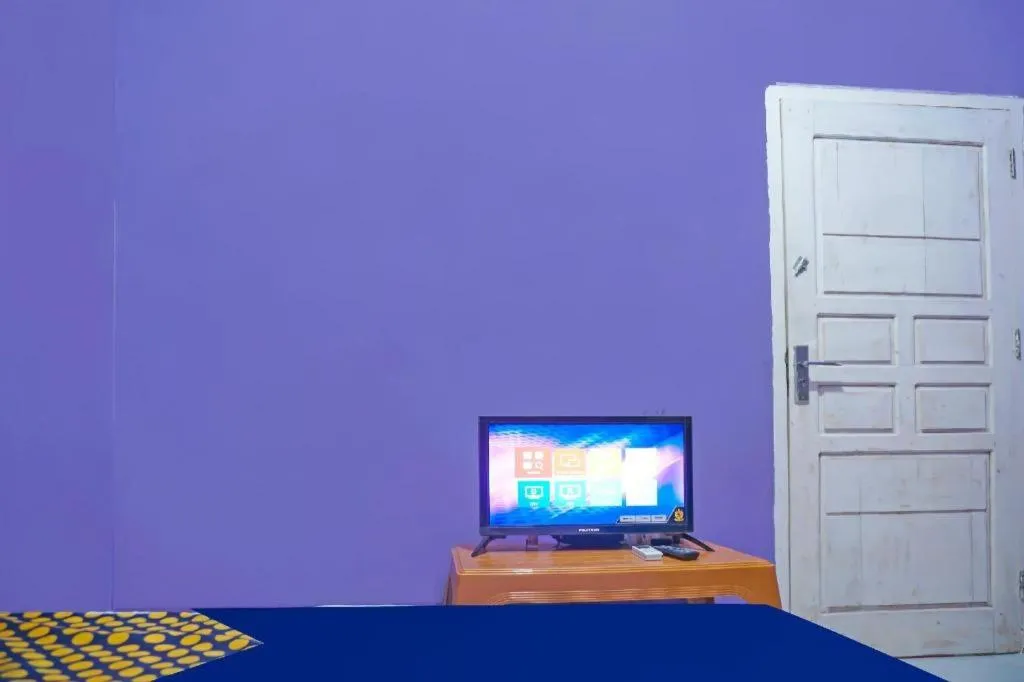 Bed in Hotel O Kost Qiu Qiu 99