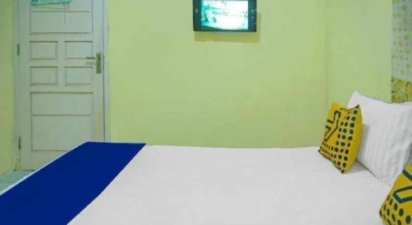 Bed in Hotel O Kost Qiu Qiu 99