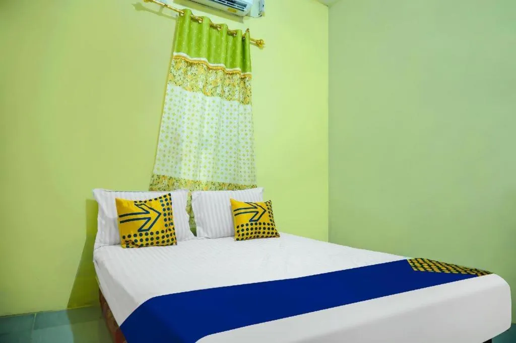 Bed in Hotel O Kost Qiu Qiu 99