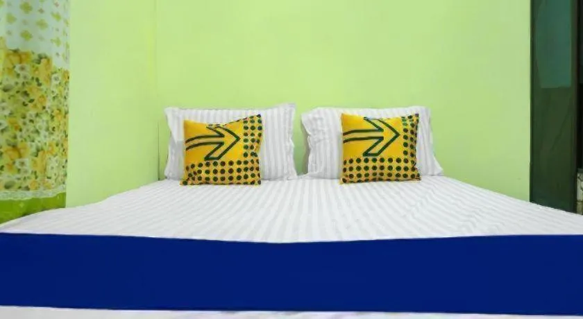 Bed in Hotel O Kost Qiu Qiu 99