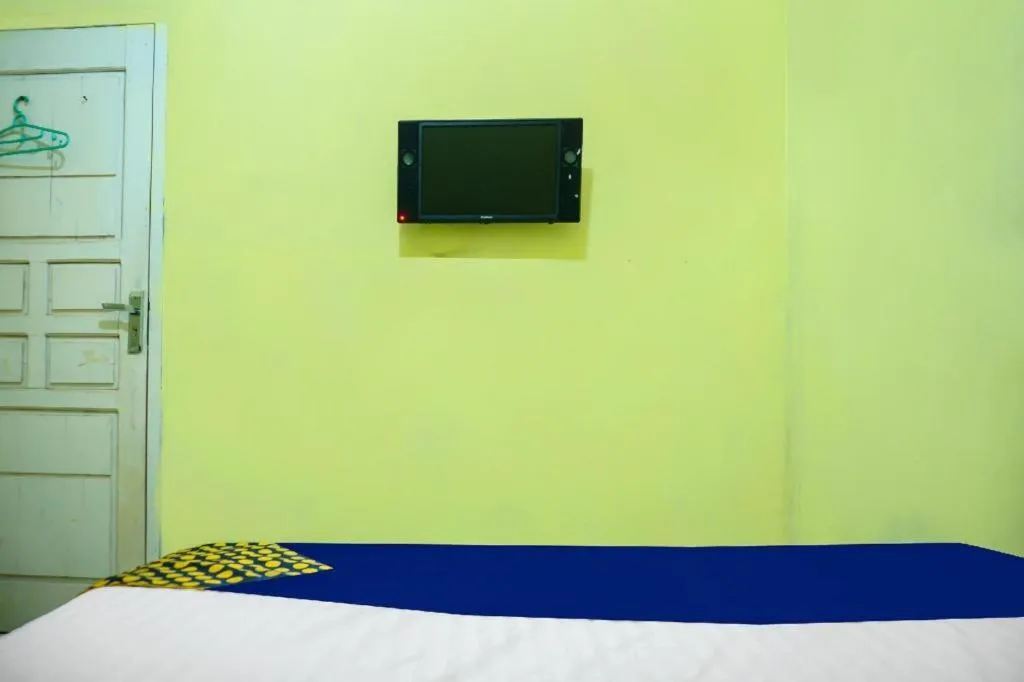 Bed in Hotel O Kost Qiu Qiu 99