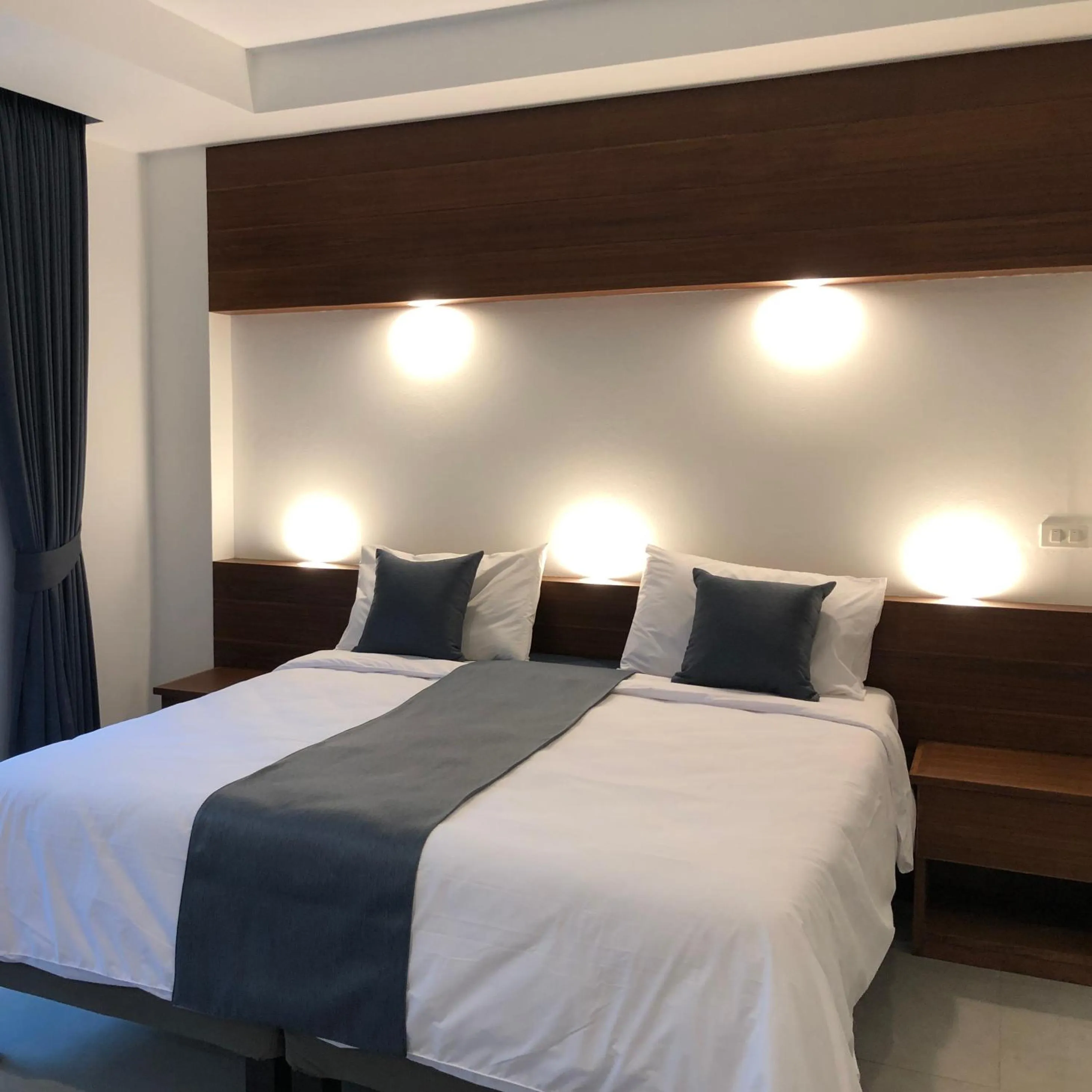 Bed in Noble House Beach Resort