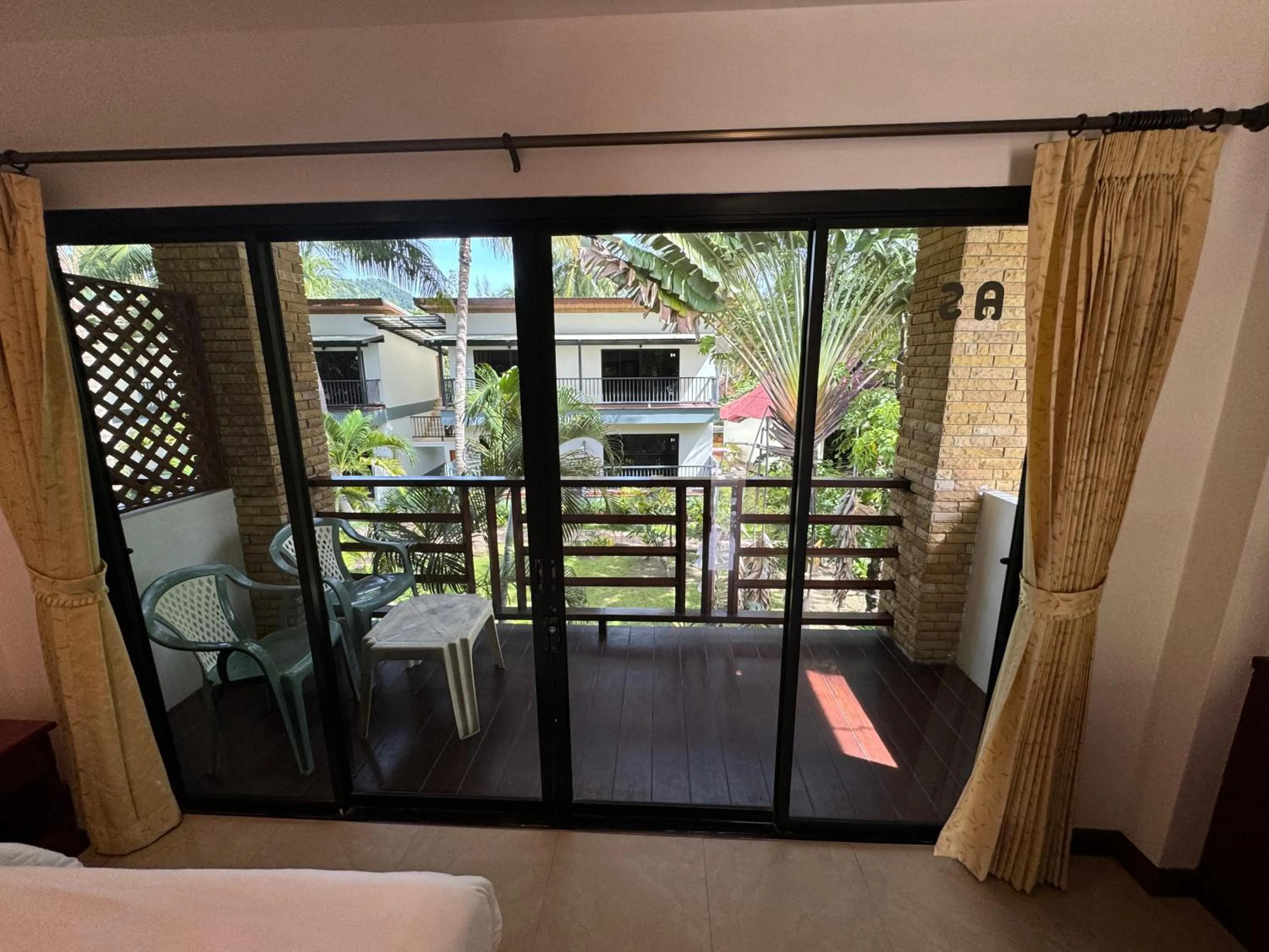 View (from property/room), Bed in Noble House Beach Resort