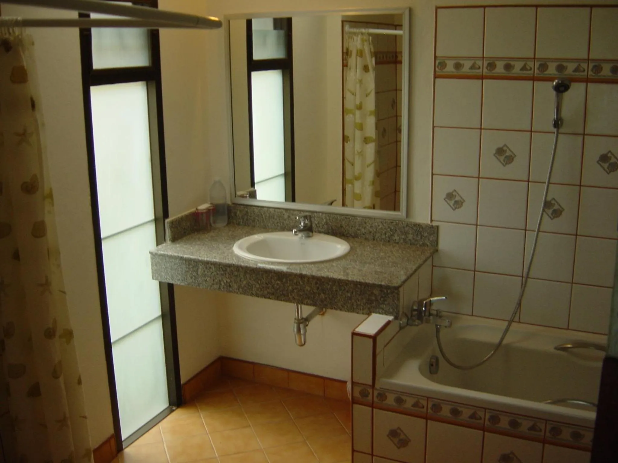 Shower in Noble House Beach Resort