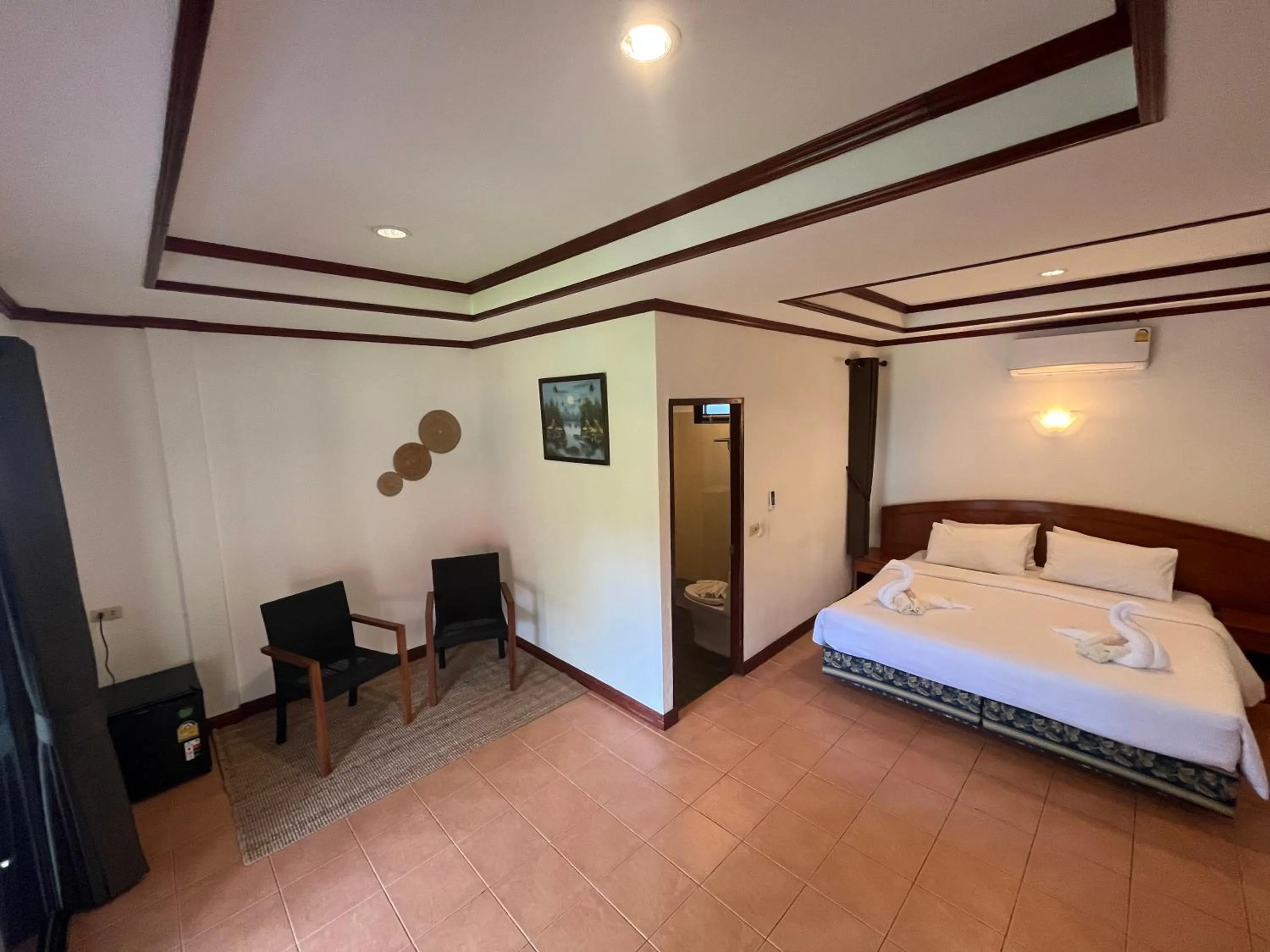 Seating area, Bed in Noble House Beach Resort