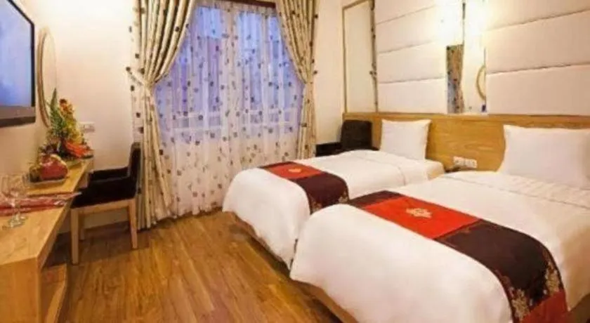 Bed in Tu Linh Palace Hotel
