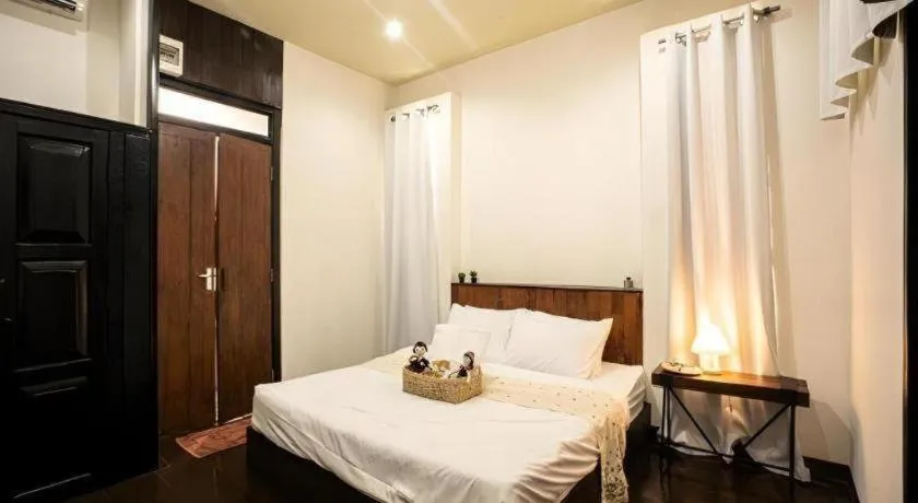 Bed in croissant hotel and cafe