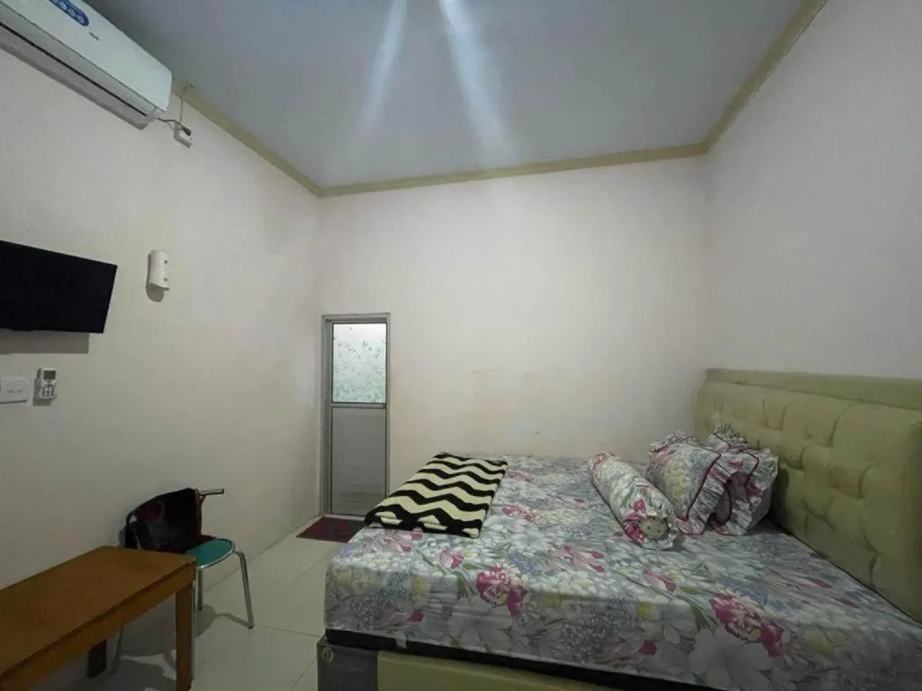 Bed in Hotel O Lima Saudara Syariah