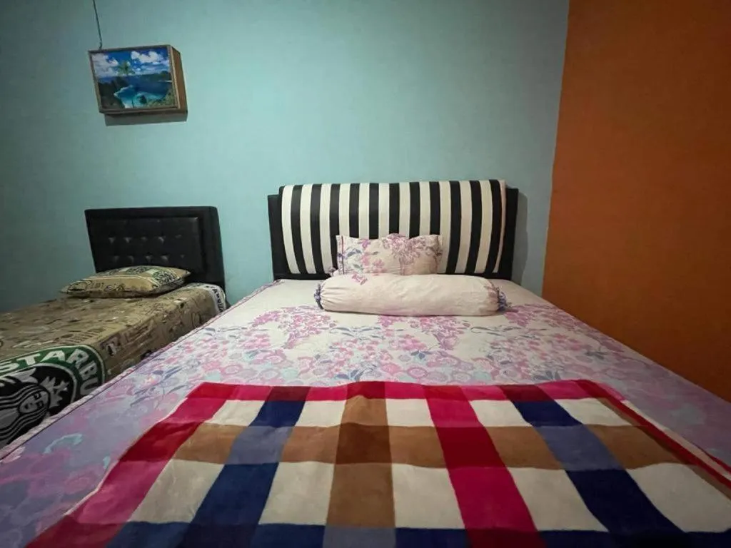 Bed in Hotel O Lima Saudara Syariah