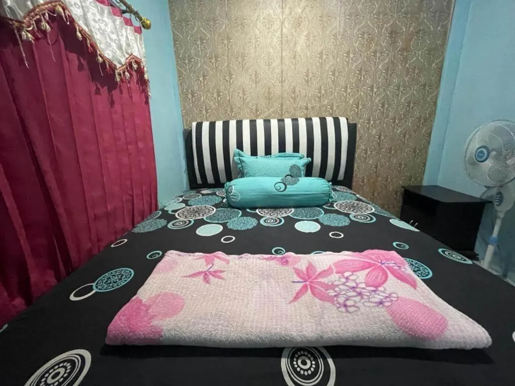 Bed in Hotel O Lima Saudara Syariah