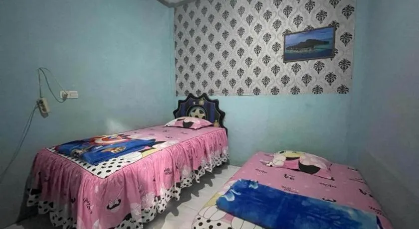 Bed in Hotel O Lima Saudara Syariah