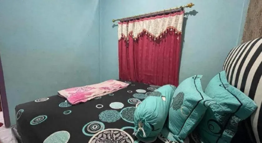 Bed in Hotel O Lima Saudara Syariah