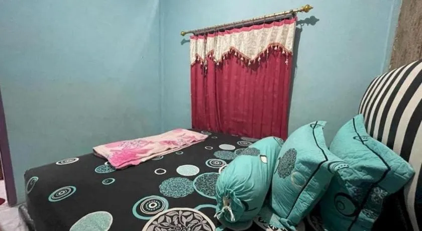 Bed in Hotel O Lima Saudara Syariah