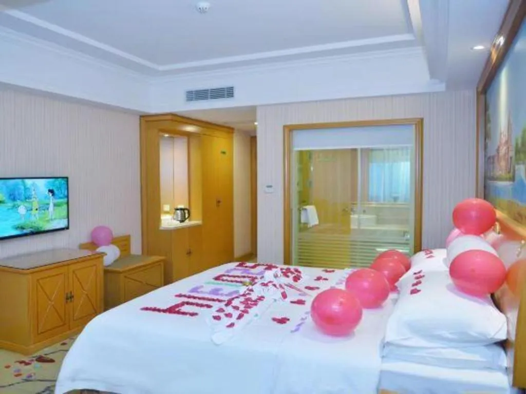 Bed in Vienna Hotel Shenzhen Bao'an Airport Taoyuanju Pingluanshan Metro Station