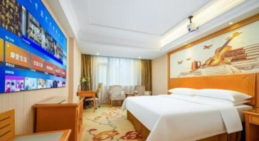 Bed in Vienna Hotel Shenzhen Bao'an Airport Taoyuanju Pingluanshan Metro Station