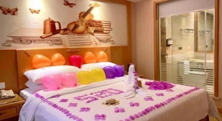 Bed in Vienna Hotel Shenzhen Bao'an Airport Taoyuanju Pingluanshan Metro Station