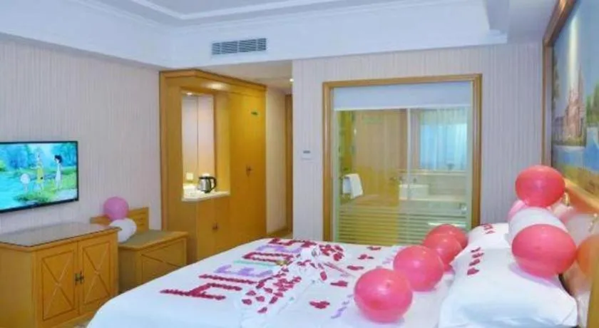 Bed in Vienna Hotel Shenzhen Bao'an Airport Taoyuanju Pingluanshan Metro Station