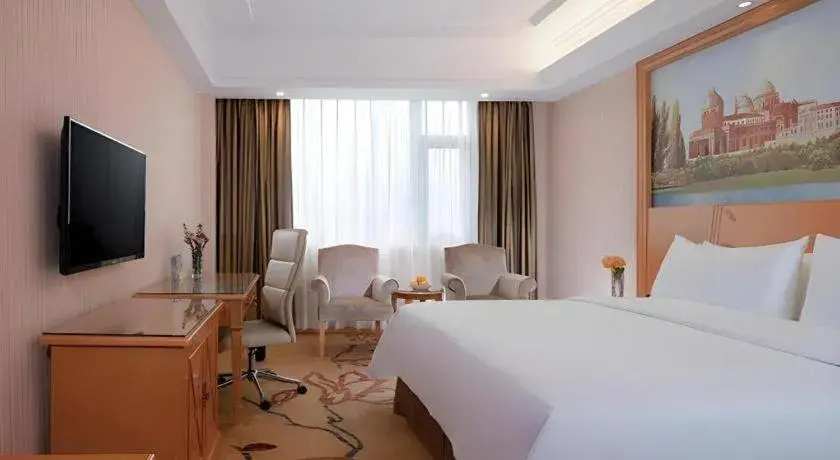 Bed in Vienna Hotel Shenzhen Bao'an Airport Taoyuanju Pingluanshan Metro Station Bed in Vienna Hotel Shenzhen Bao'an Airport Taoyuanju Pingluanshan Metro Station