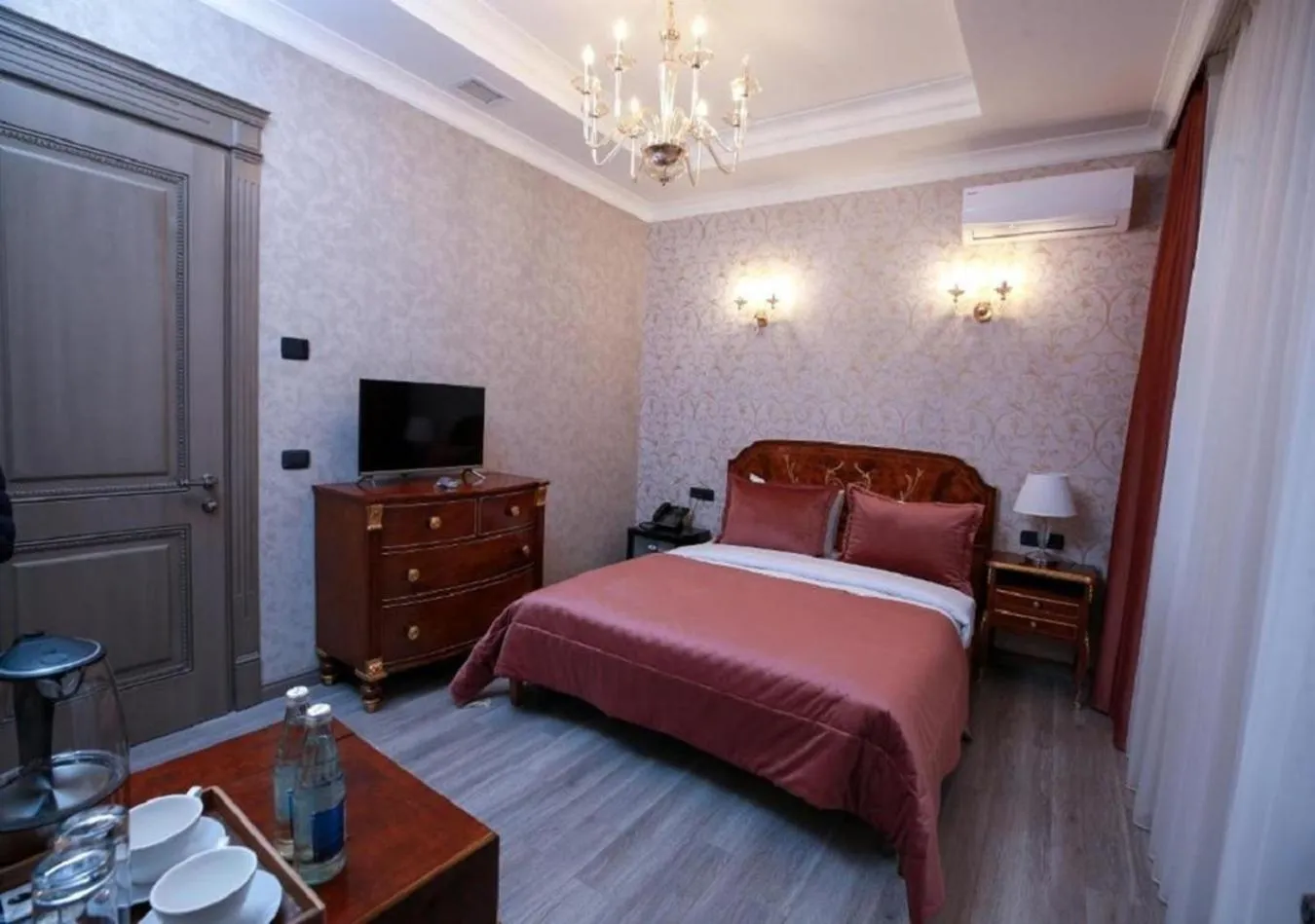 Bed in West Inn Hotel & Restaurant