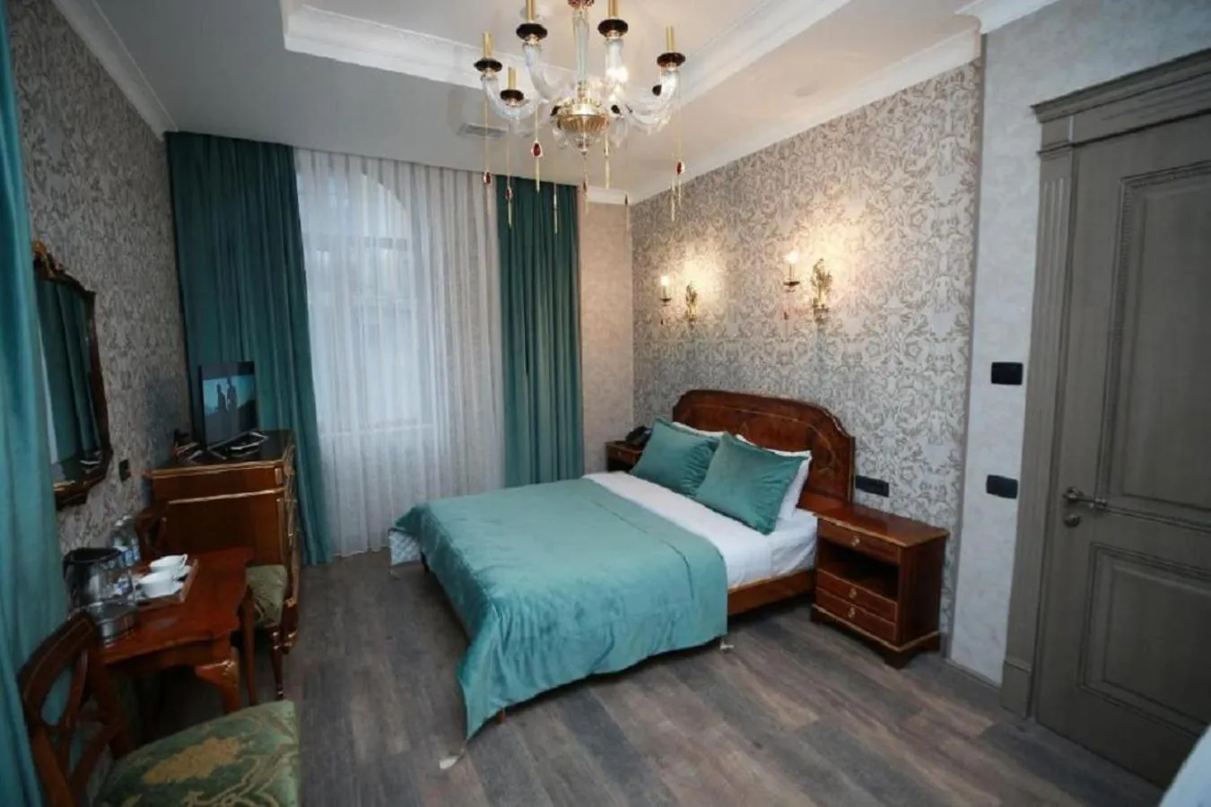 Bed in West Inn Hotel & Restaurant