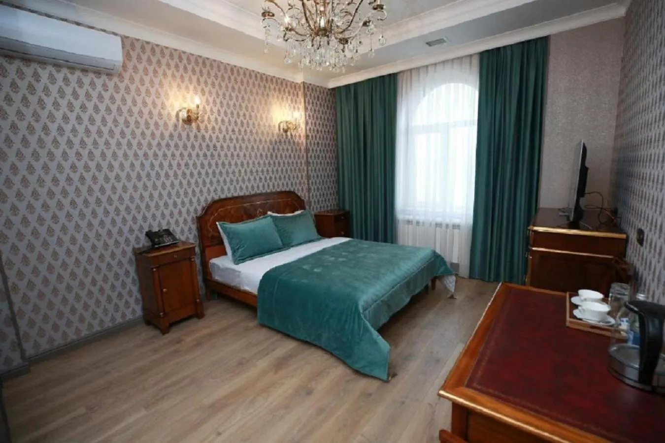 Bed in West Inn Hotel & Restaurant