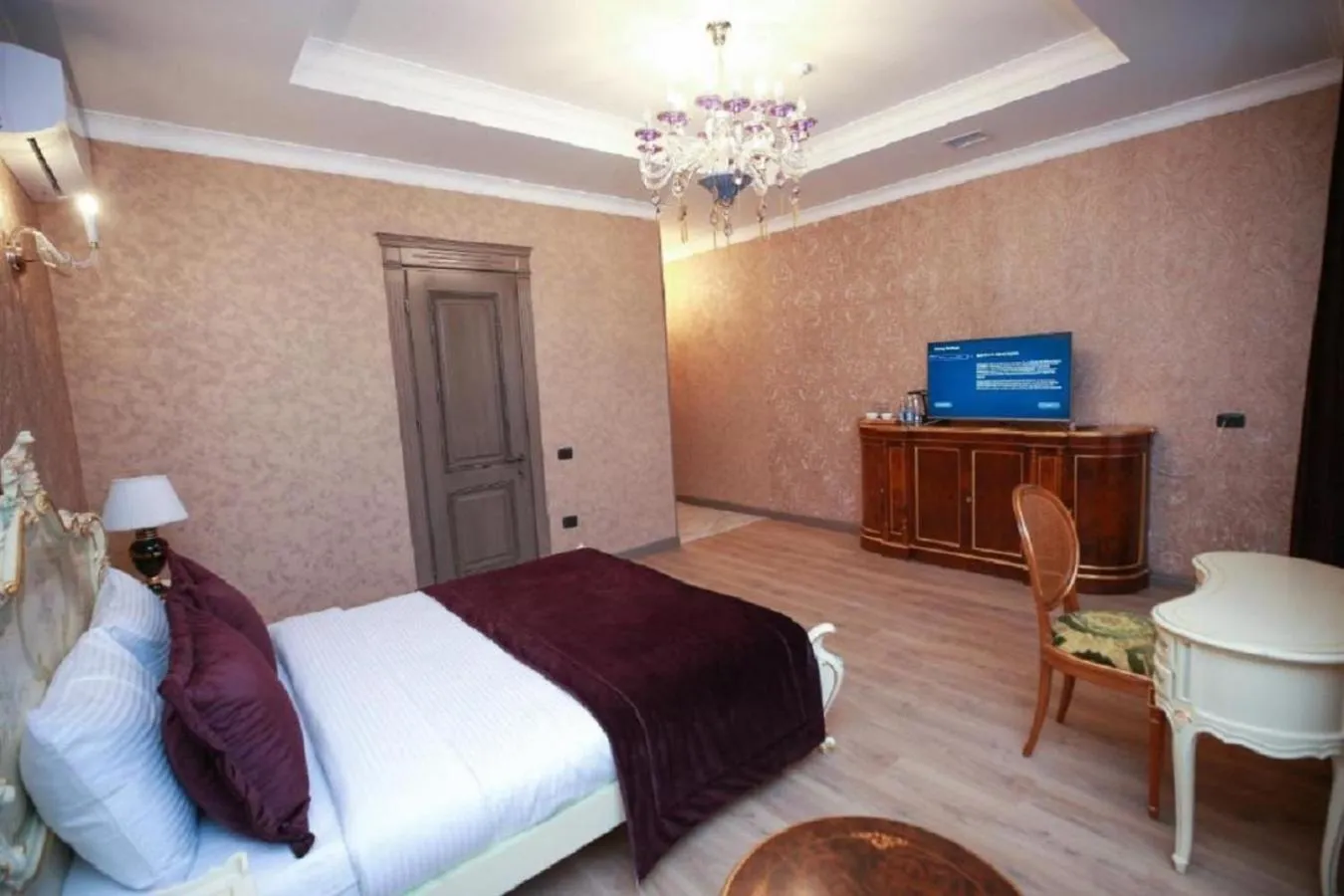 Bed in West Inn Hotel & Restaurant