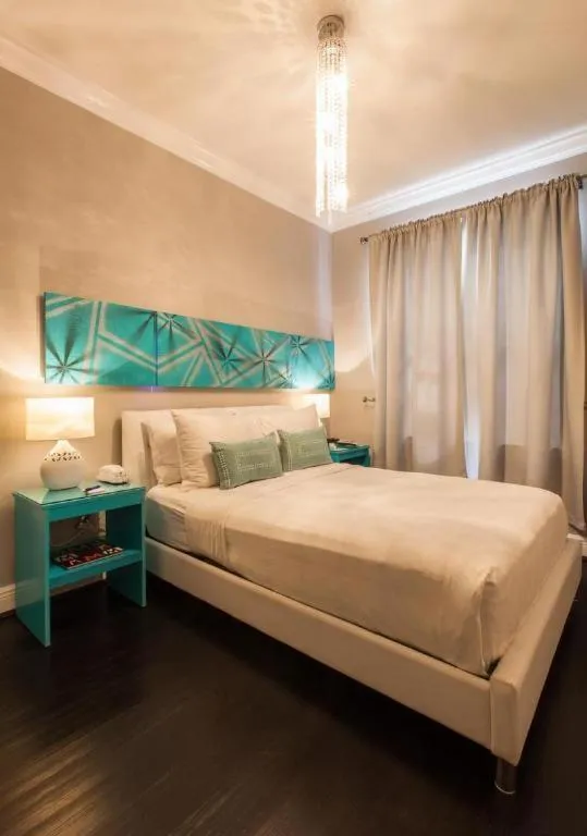 Bed in Odyssey of South Beach Apart Hotel