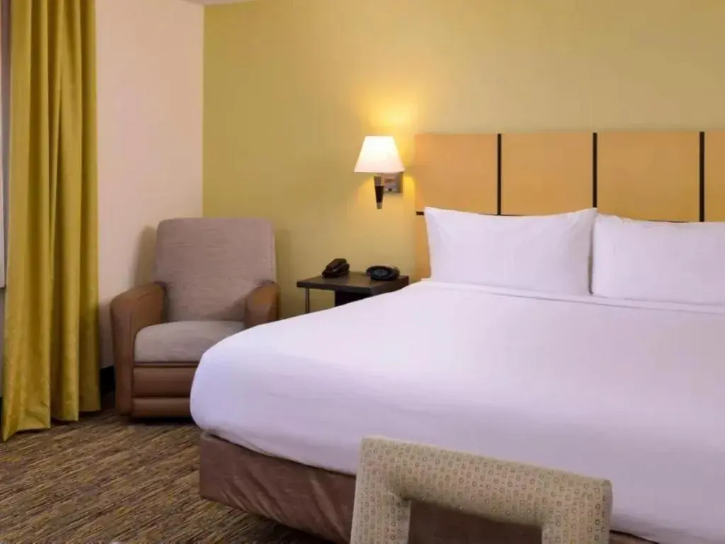 Bed in Candlewood Suites Jefferson City By IHG Bed in Candlewood Suites Jefferson City By IHG